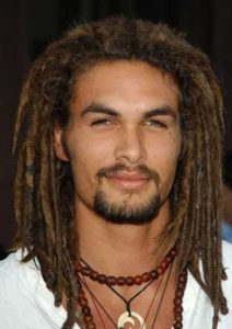 Caucasian blond guy with dreadlocks