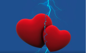 One large and one small red heart touching each other are struck by blue lightening.