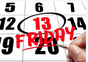 Numbers on a calendar with the number 13 circled and the word Friday underneath in red.
