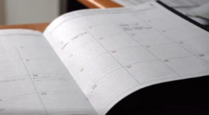 A large open appointment book.