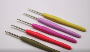 Crochet hooks in various colours.