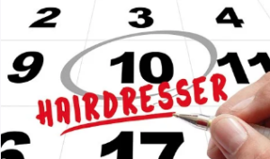 Calendar with a note for hairdresser on the 10th.
