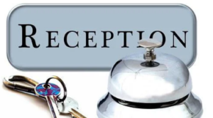A silver bell and a set of keys under a sign marked "reception".