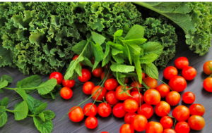 Display of kale, tomatoes and herbs.