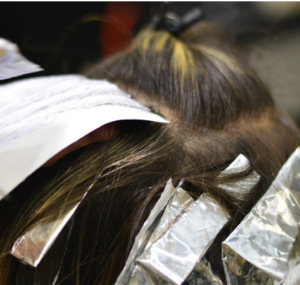 A head filled with silver foils for highlighting.