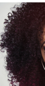 Black 4C hair in curls.