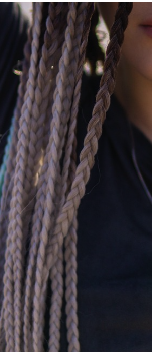 Large white-gray single braids extensions.