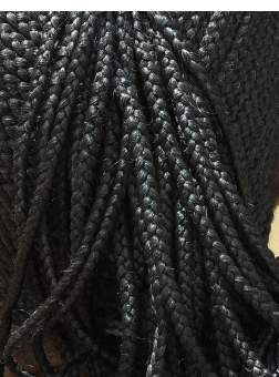 Single synthetic hair extensions in black.